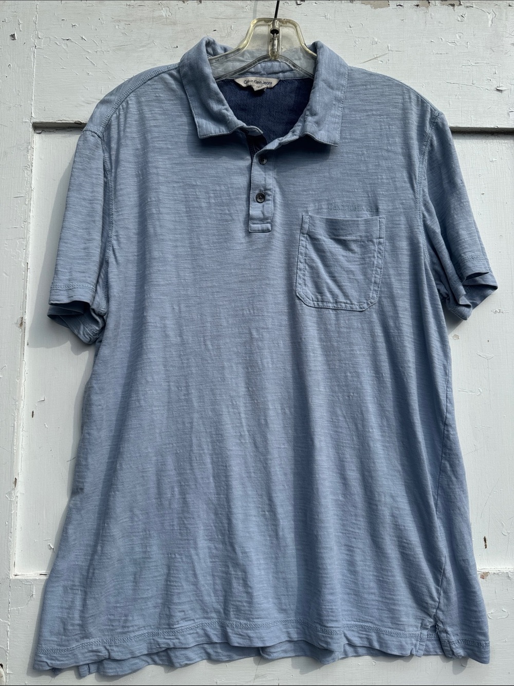 Calvin Klein Jeans Men's Light Blue Polo with Chest Pocket